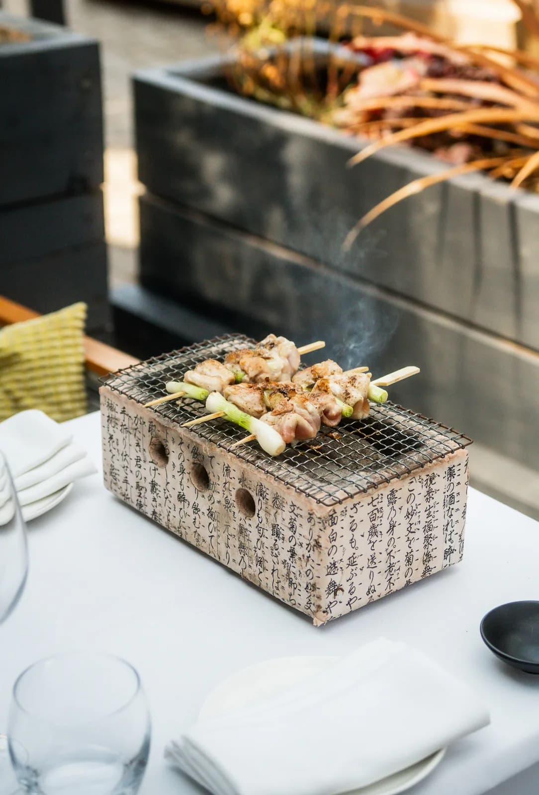 Chicken yakitori on the binchotan robata